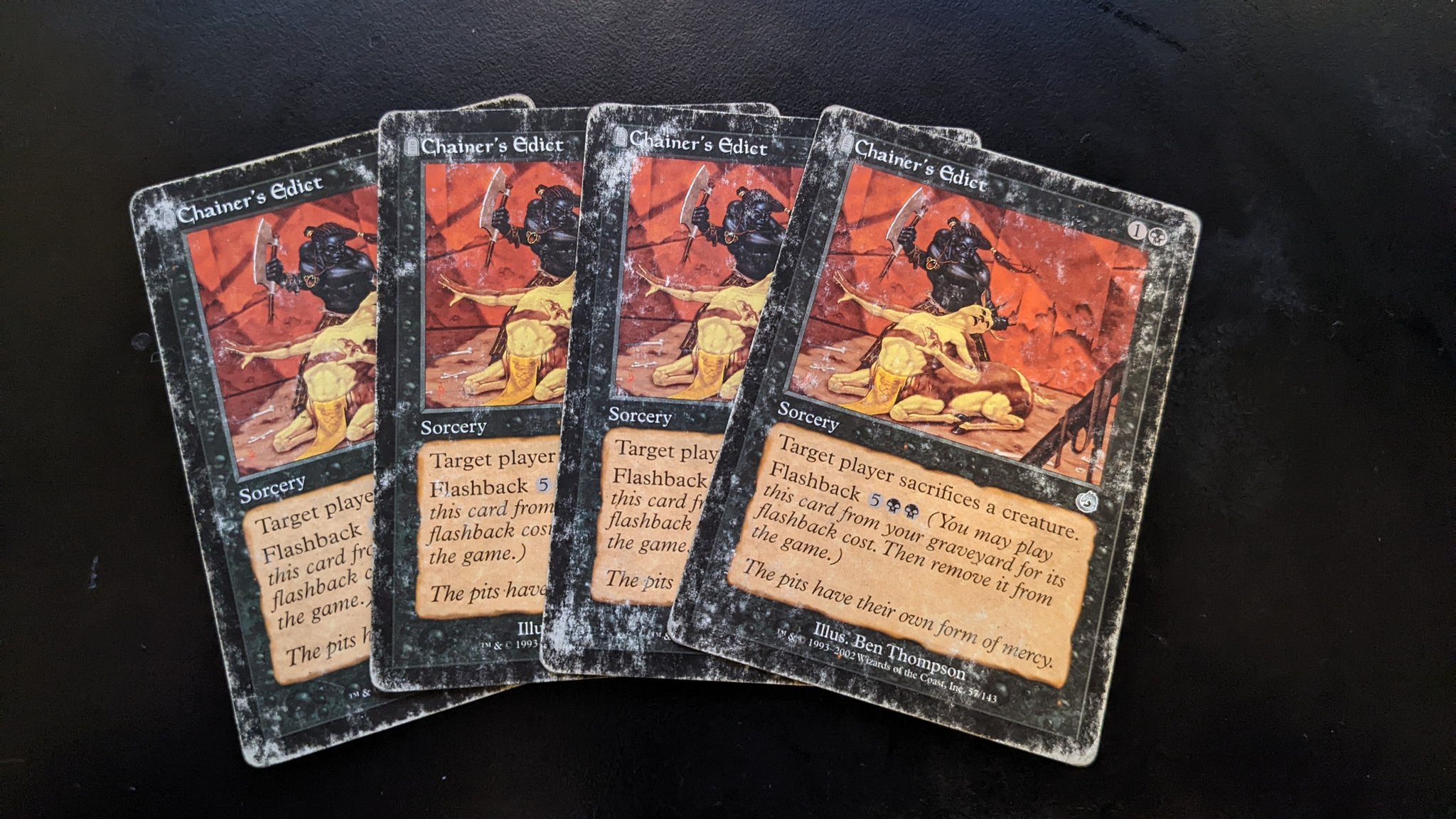 a playset of Chainer's Edicts with white-worn edges