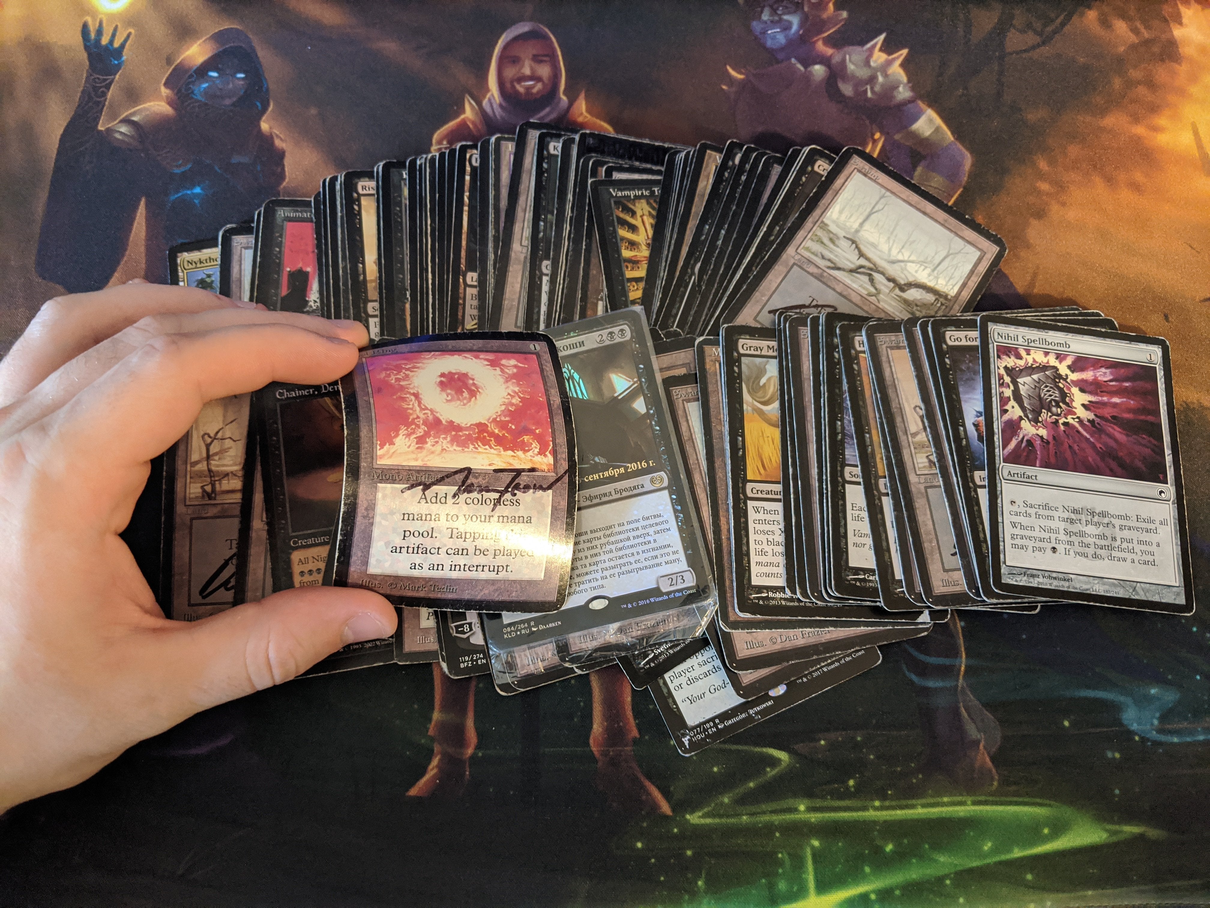 a beat-up pile of mono-black MTG cards