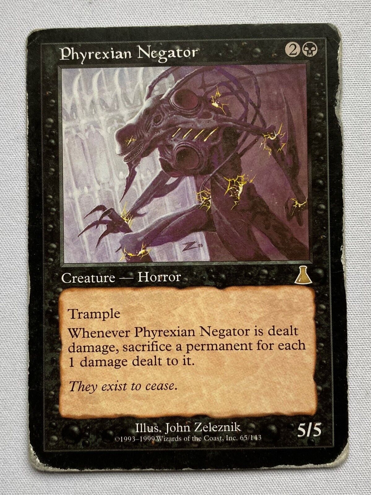 a Phyrexian negator with rounded edges